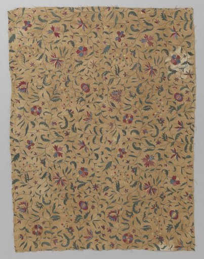 Fragment of cotton with multicoloured embroidery in silk