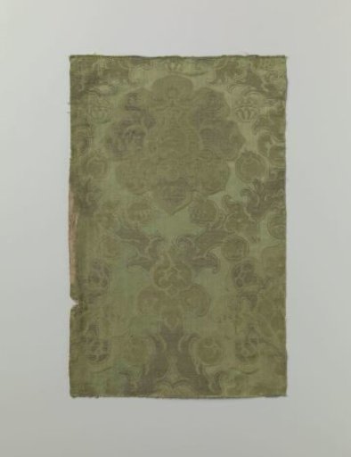 Fragment of green damask brocade with pomegranate motifs