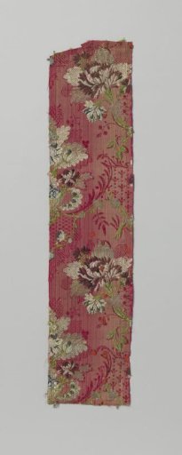 Fragment of red brocaded silk with a multicolored pattern of bouquet and floral garlands and so-called kantrand