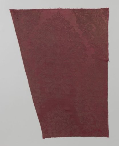 Fragment of wine-red silk damask with a pattern of floral and foliate work and so-called lacework