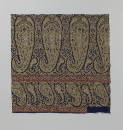 Fragment of wool from a cashmere shawl with a pattern of palm shapes on a blue ground