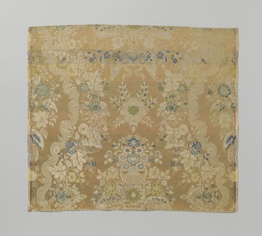 Fragment of multicolored brocaded silk with a pattern of flowers and flower bouquets, grapevines, and scrolling ribbons on a salmon-colored ground
