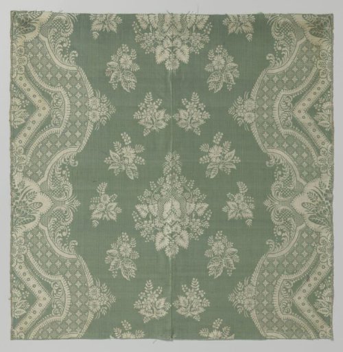 Two sewn-together silk fabric fragments