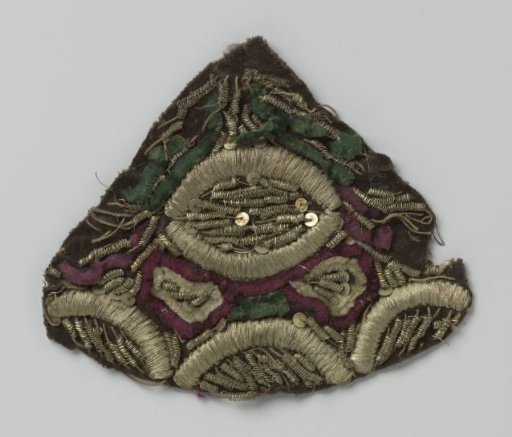 Fragment of velvet with multicolored embroidery