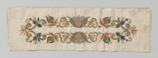 Fragment of white silk fabric with multicolored embroidery