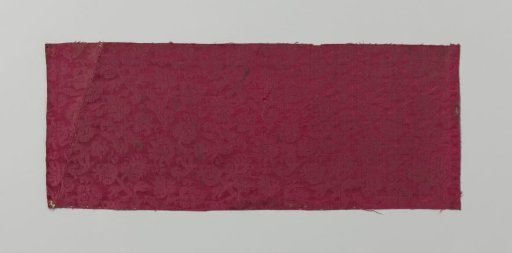 Fragment of two pieces of red silk sewn together