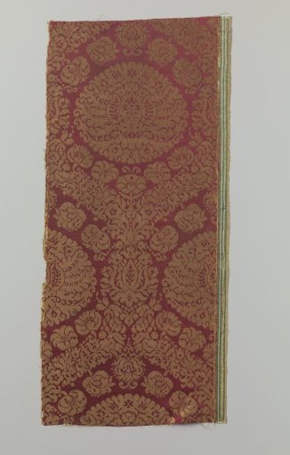 Fragment of red and yellow silk damask