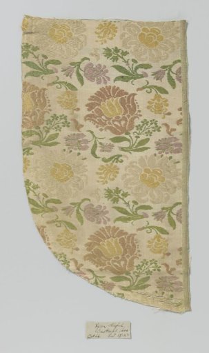 Fragment of silk fabric with large and small flowers in green, yellow, brown and lilac on a ground of white taffeta