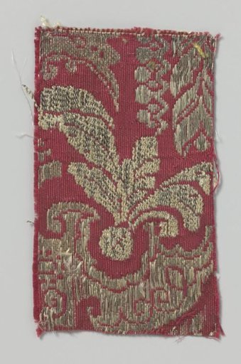Fragment of red silk with a pattern in gold and silver thread