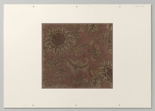 Fragment of coarse linen weave, red ground, flowers of yellow and brown