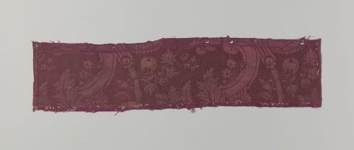 Fragment of red silk damask
