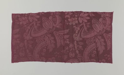 Fragment of red silk damask