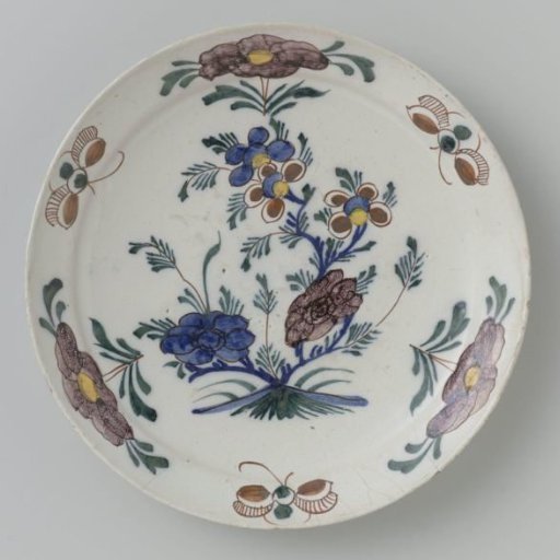 Plate of multicolored painted faience