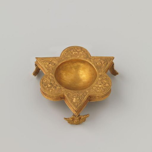 Galvanoplastic reproduction of a salt cellar resting on three cherub heads
