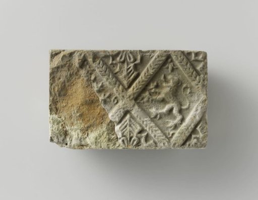Fireplace stone with a representation of two climbing lions, set in two panels