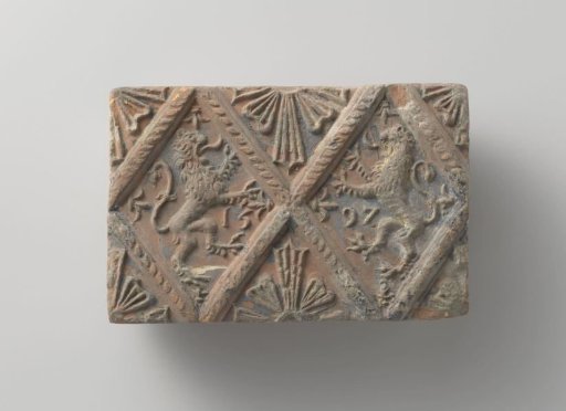 Fireplace surround with black lozenges