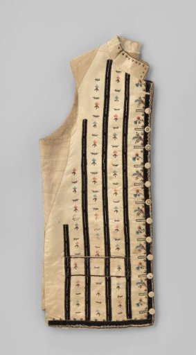 Waistcoat with standing collar of white satin, decorated with black velvet stripes with cream chenille and embroidered scattered and floral motifs with leaves and blue stones; 12 buttons.