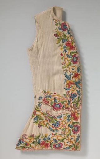 Waistcoat of cotton piqué, with an embroidered border of large coloured flowers of wool (crewelwork)