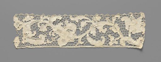 Strip of needle lace with iris and lily