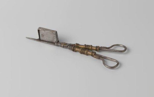 An iron snuffer fitted with copper