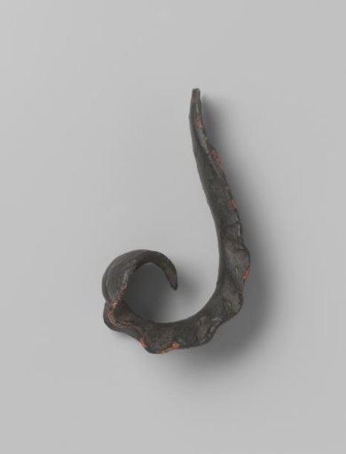 Part of a balcony railing with a mirror monogram