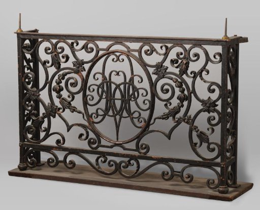 Balcony railing with mirror monogram