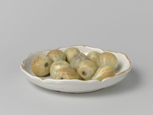 Plate with a scalloped rim and ten applied pears