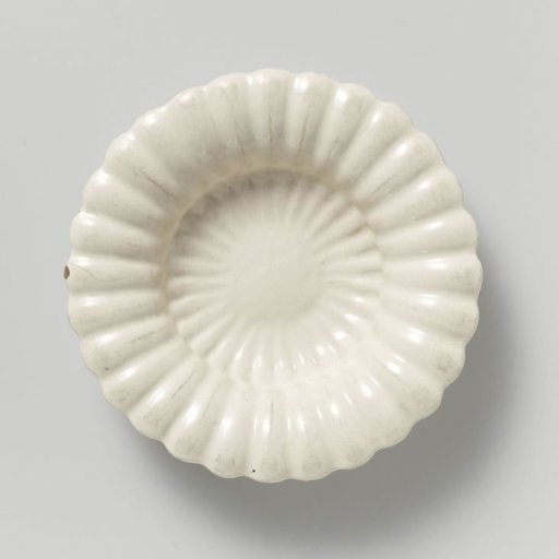 Glazed white saucer
