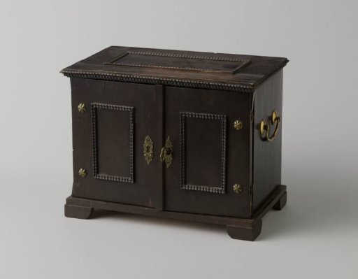 Cabinet of ebony with two doors with panels with rope moldings. Interior with nine drawers, painted with landscapes, etc.