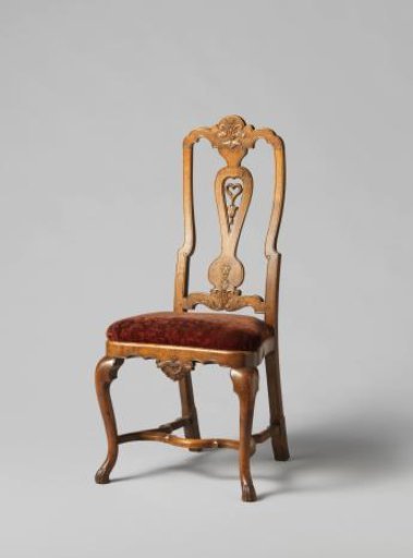 Chair with S-shaped front legs placed diagonally and carved parts. Shell and acanthus leaf decoration. Loose seat upholstered in floral velvet