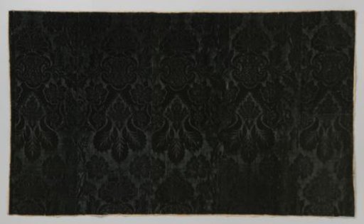 Fragment of wall covering of pressed tripe (?), in dark green