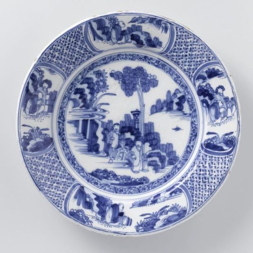 Plate, painted in blue on the flat with a landscape featuring a tree and two Chinese figures. Border decorated with four oval scenes on a checkered ground