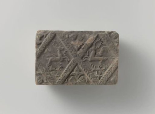 Fireplace with Winged Stags Running Towards Each Other