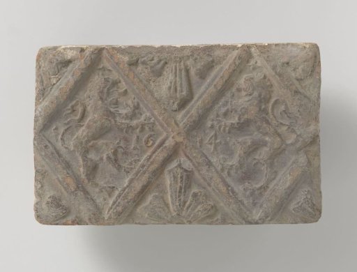 Fireplace with a Depiction of Two Climbing Lions, Placed in Two Panels