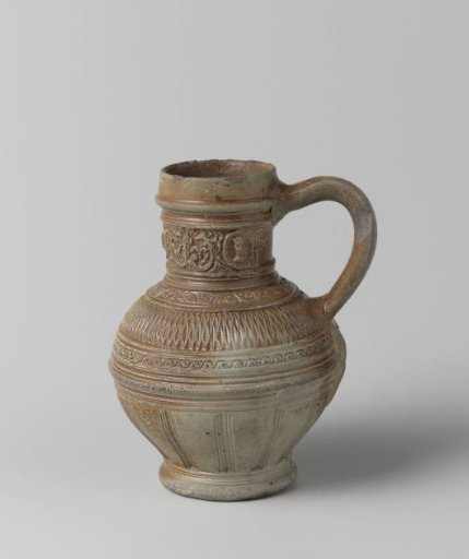 Jug with medallions, foliate scrolls and chip carving
