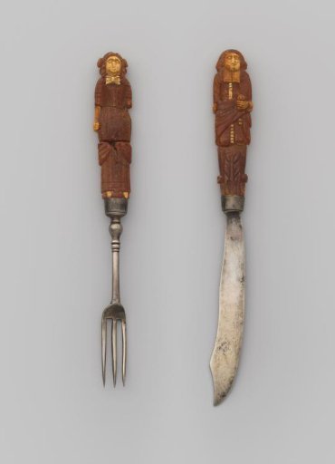 Knife with a carved handle in the form of a gentleman