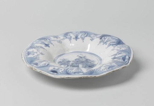 Plate, eight-lobed, painted with a vase of flowers