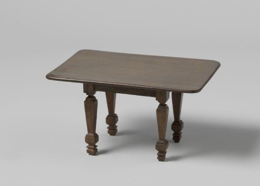 Table with a rectangular top, standing on four baluster-shaped, profiled legs
