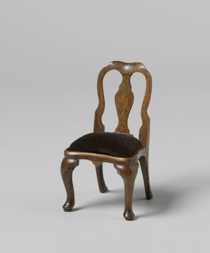 Chair with open backrest with central stile, the seat with green velvet