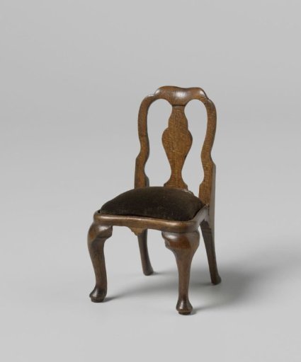 Chair with open backrest with central stile, the seat with green velvet