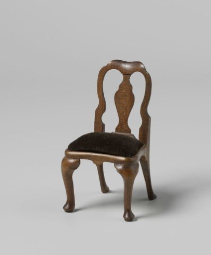 Chair with open backrest and central stile, seat upholstered in green velvet