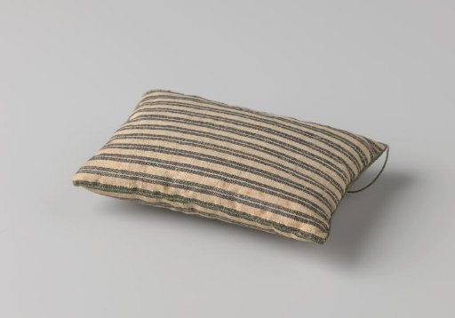 Mattress, blue-and-white striped, edged with a green cord