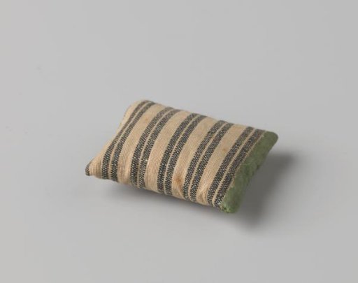 Cushion, blue and white striped, trimmed with green cord