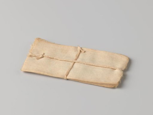 Stack of cloths, bound with a band