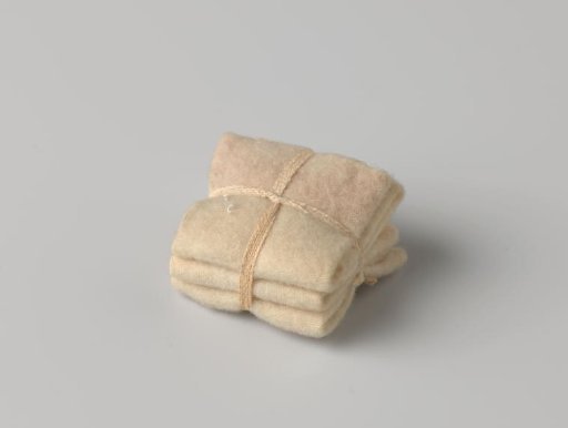 Stack of blankets, bound with a band