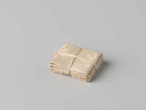 Stack of four canvases, bound with a band