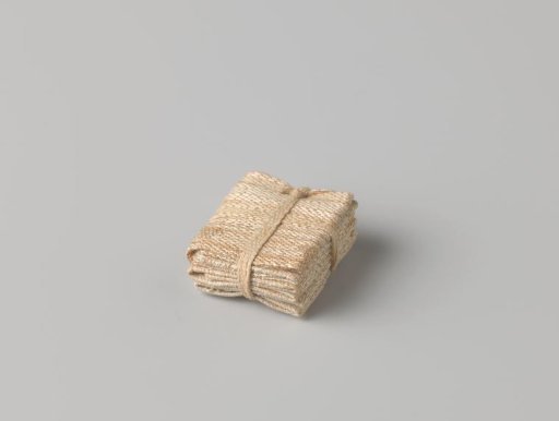 Stack of four canvases, bound with a band