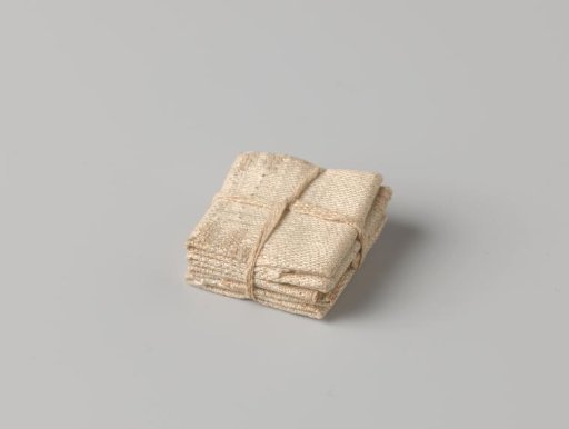 Stack of four canvases, bound with a band
