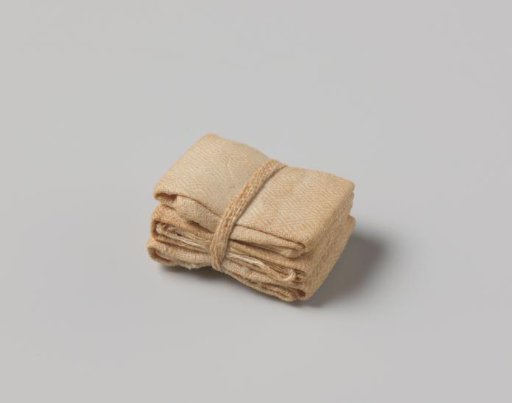 Pile of three folded and tied napkins