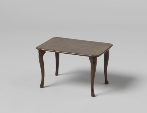 Table with rectangular top, on four S-shaped, diagonally placed legs